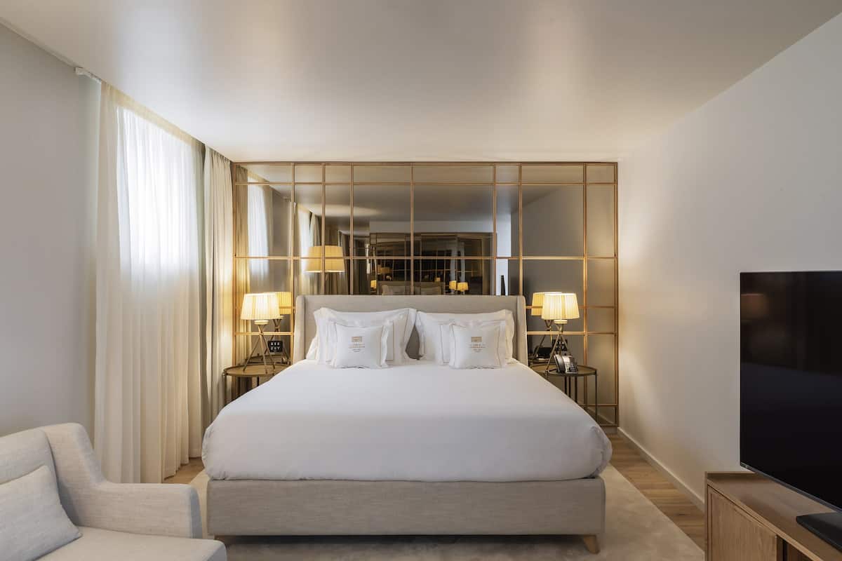 Suite, 1 King Bed, Balcony (Cathedral View) | 1 bedroom, minibar, in-room safe, laptop workspace