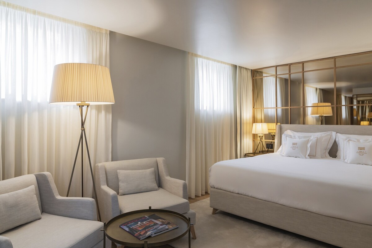 Suite, 1 King Bed, Balcony (Cathedral View) | Minibar, in-room safe, laptop workspace, blackout curtains
