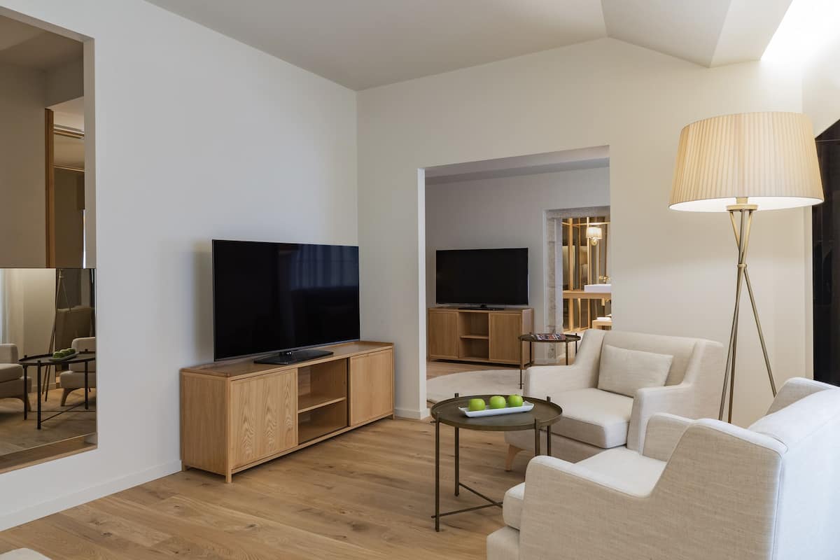 suite, 1 bedroom | living area | 55-inch smart tv with cable channels, tv