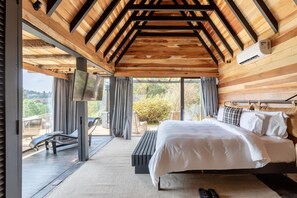 Roupas de cama premium, edredons de pluma, frigobar, cofres nos quartos