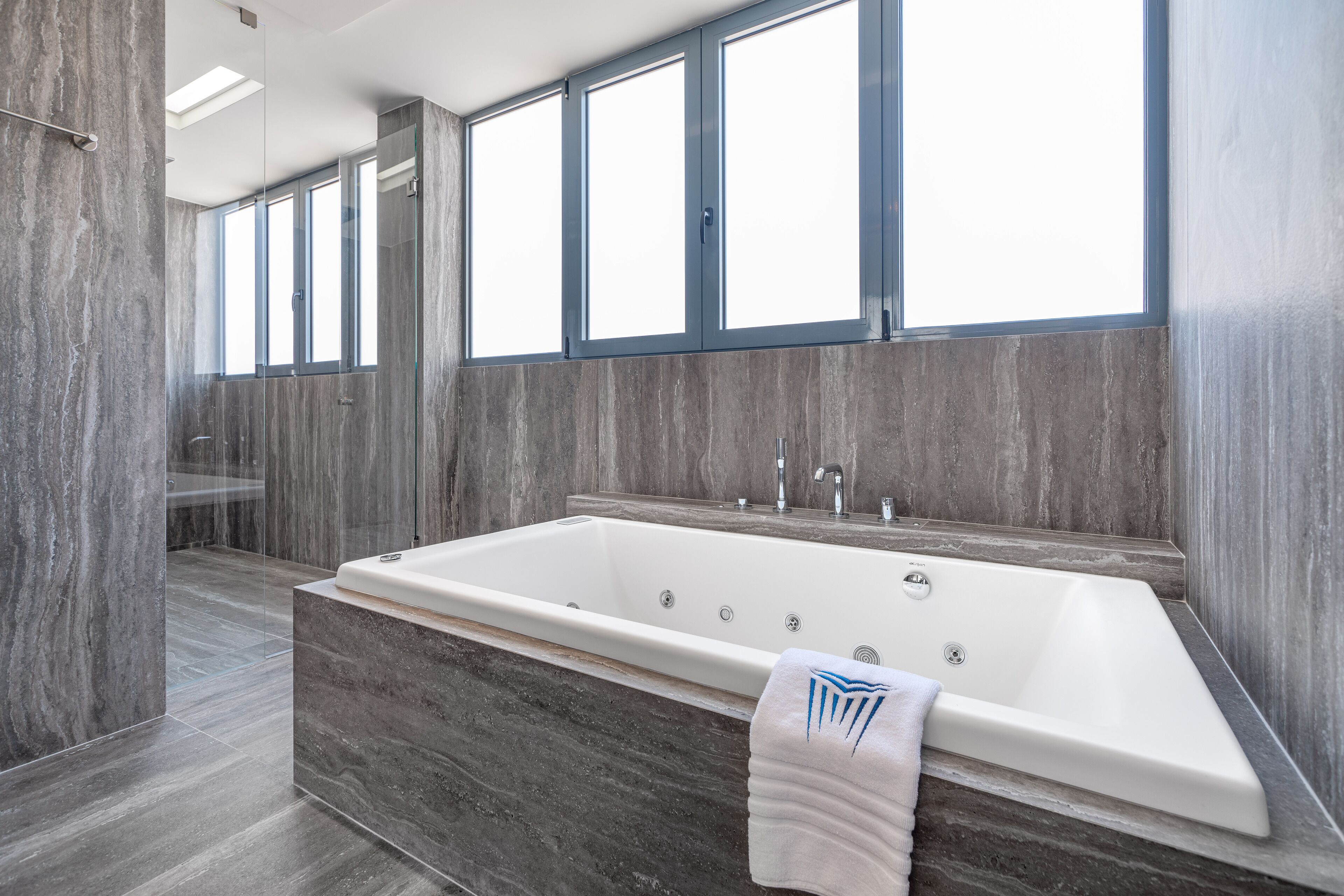 hellenic vibes suite | bathroom | shower, rainfall showerhead, free toiletries, hair dryer