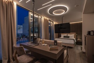 Hellenic Vibes Suite | Living area | 55-inch Smart TV with satellite channels, TV, Netflix