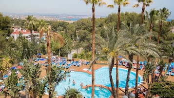 Seasonal outdoor pool, pool umbrellas, pool loungers