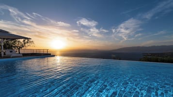 Seasonal outdoor pool, pool umbrellas, sun loungers