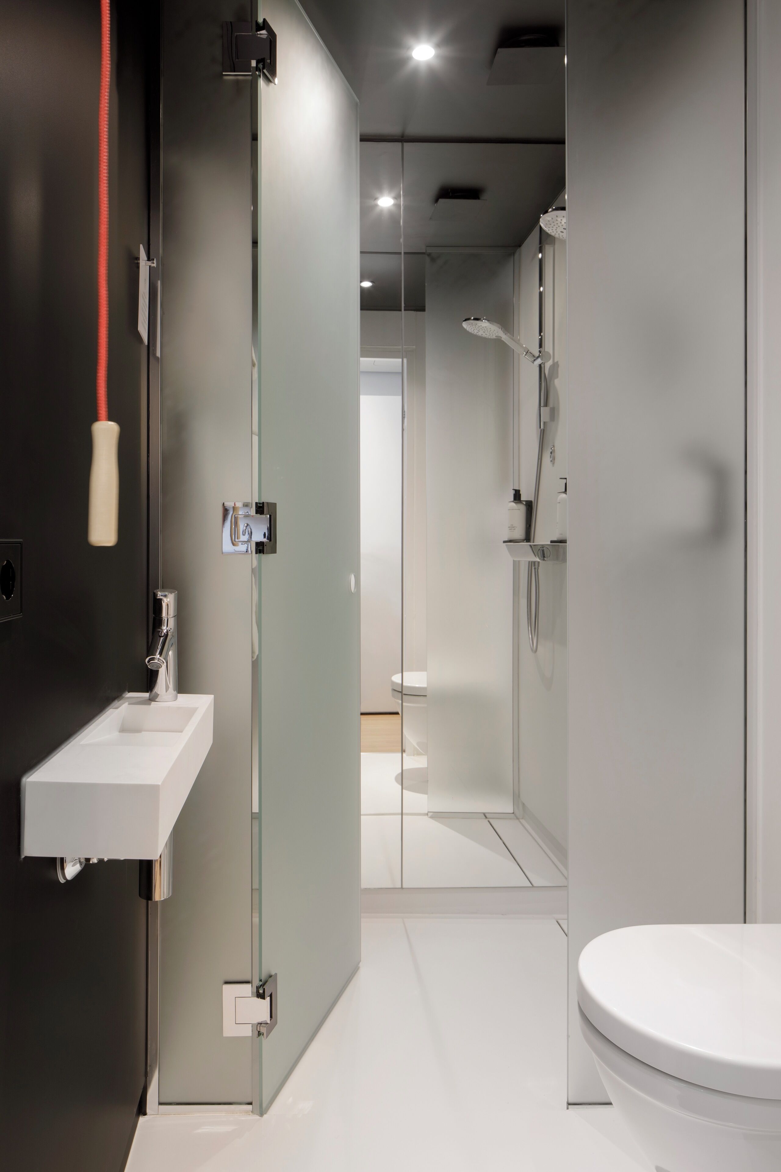 zoku room | bathroom | shower, rainfall showerhead, eco-friendly toiletries, hair dryer