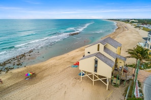 On the beach, sun loungers, beach towels