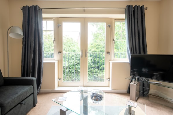 Departamento, baño privado, vista al patio | Lounge