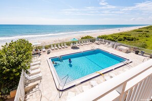 Outdoor pool, a heated pool - Ocean front corner unit with quiet beach (Indian Harbour Beach)