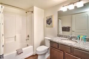 Bathtub, hair dryer, towels