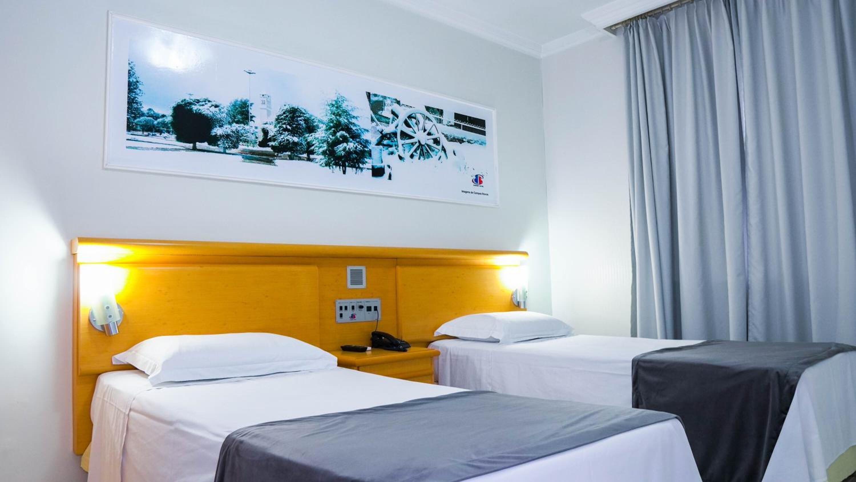 minibar, desk, laptop workspace, blackout curtains