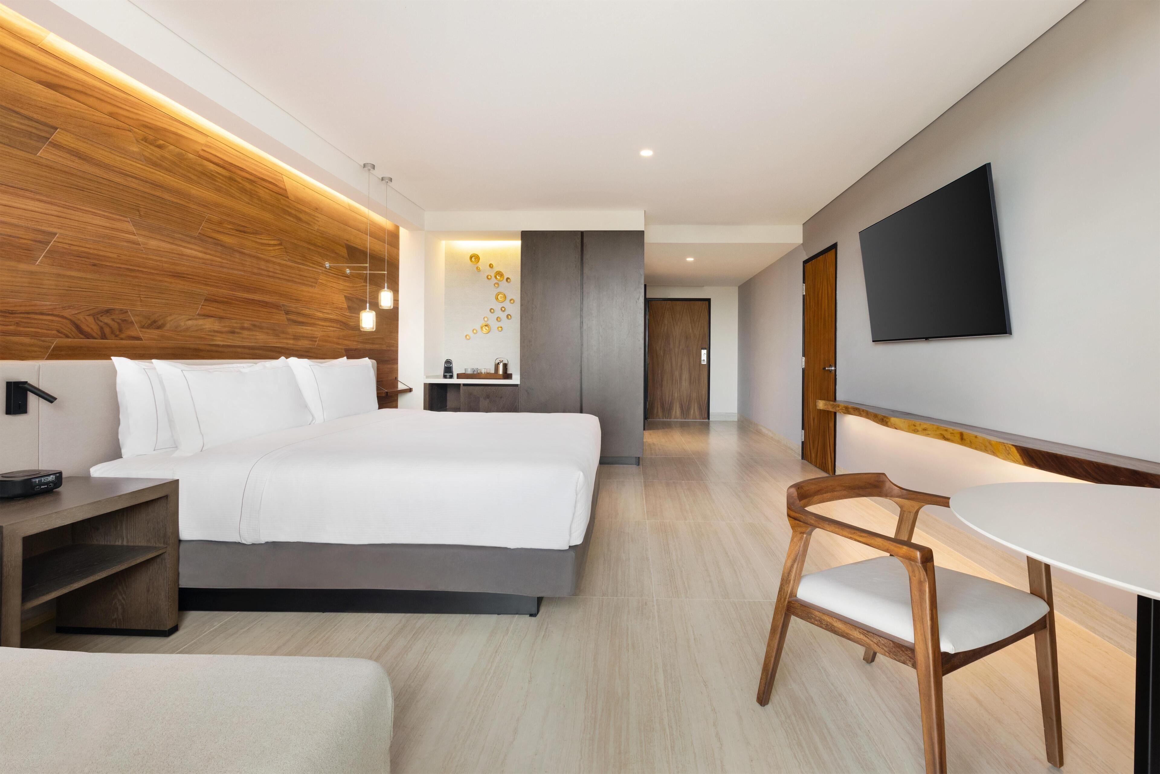 ONE KING BED GUESTROOM MOBILITY ACCESSIBLE | Hypo-allergenic bedding, in-room safe, iron/ironing board