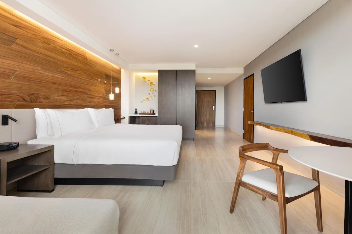 ONE KING BED GUESTROOM MOBILITY ACCESSIBLE | Hypo-allergenic bedding, in-room safe, iron/ironing board