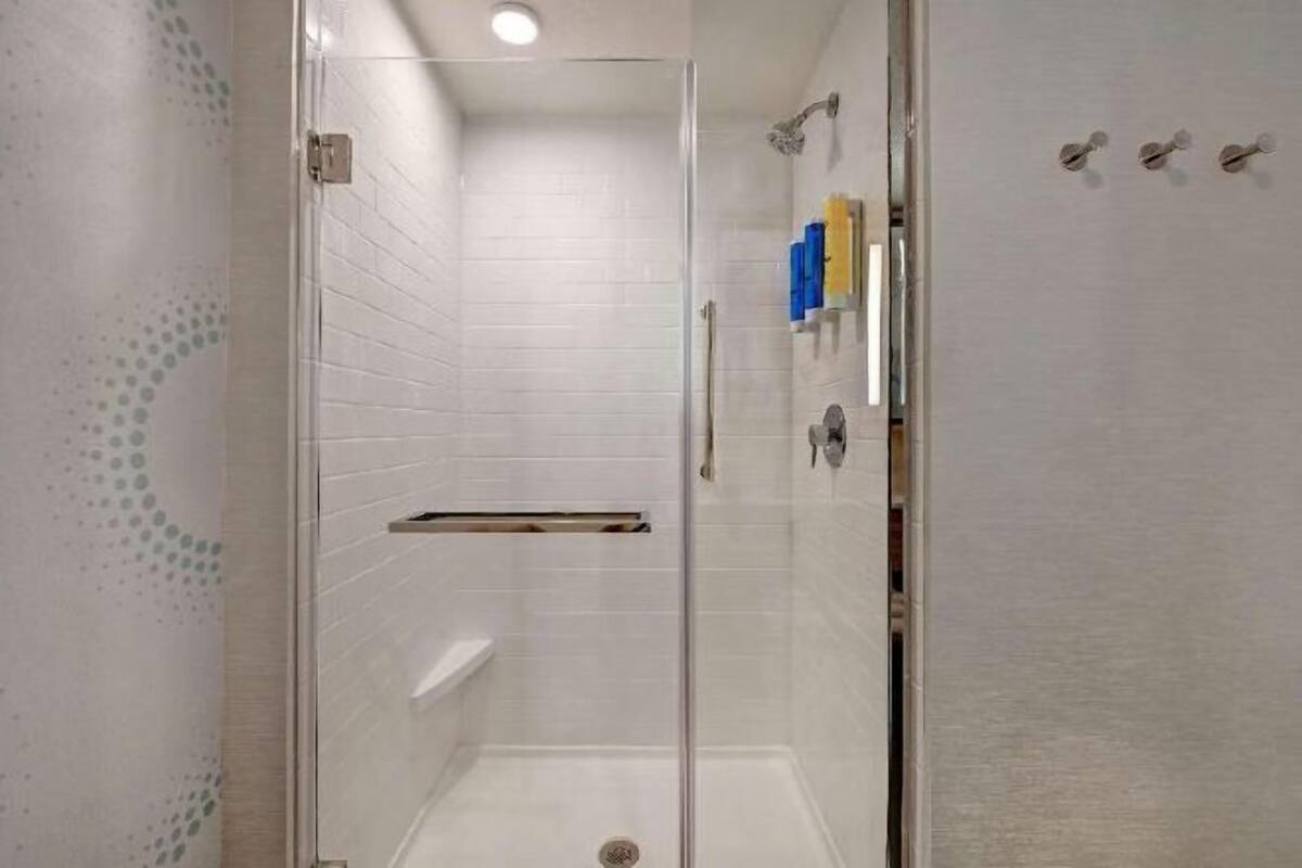 Hair dryer, towels, soap, shampoo