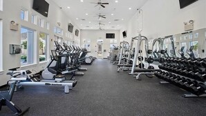 A gym with treadmills, stationary bikes, and weight machines. - Luxurious Villa - Near Disney - Golf Course (Davenport)