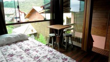 Quarto standard | Frigobar, roupa de cama