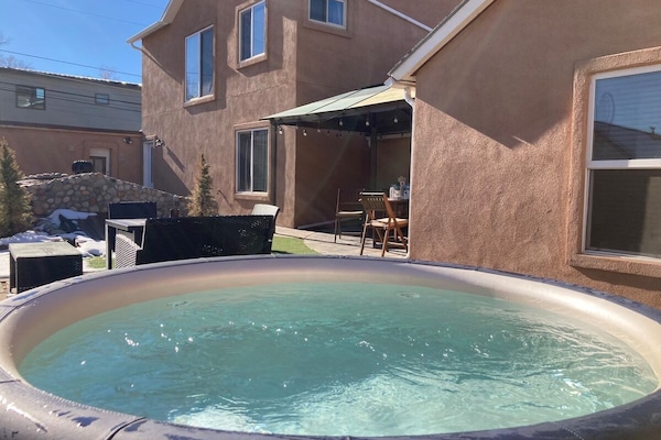 Private hot tub in spacious gated courtyard