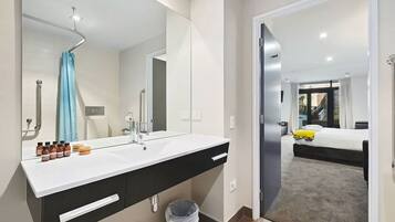 Shower, hair dryer, towels
