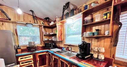 Waterfront Retreat with fenced yard, porch + bar, canal views, NEW DOCK