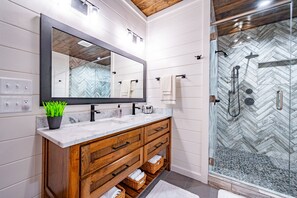 Bathtub, hair dryer, towels, soap