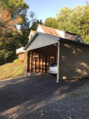 Set amidst a serene natural landscape, this single-story building offers a garage and scenic views.