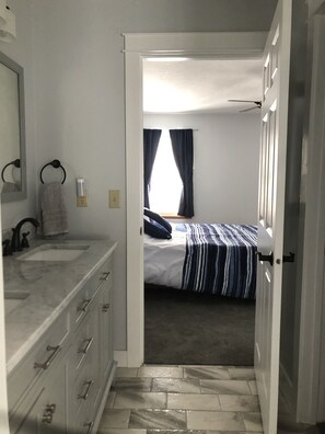 Bathtub, hair dryer, bidet, towels