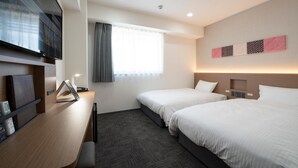 A hotel room with two beds, a desk, a TV, and a window with curtains. - R&B Hotel Nagoya-Ekimae (Nagoya)