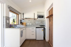 Fridge, microwave, coffee/tea maker, toaster
