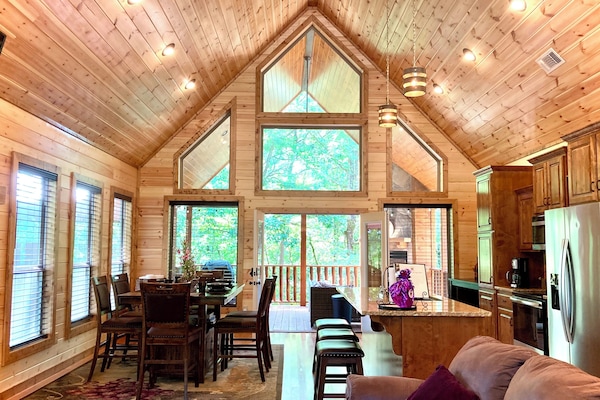 Modern open concept design living space with amazing outdoor views all around.