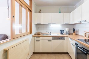 Fridge, microwave, dishwasher, coffee/tea maker