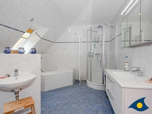 Shower, hair dryer, towels