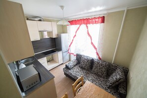 Apartment, 1 Bedroom | Private kitchen | Fridge, stovetop, electric kettle, cookware/dishes/utensils