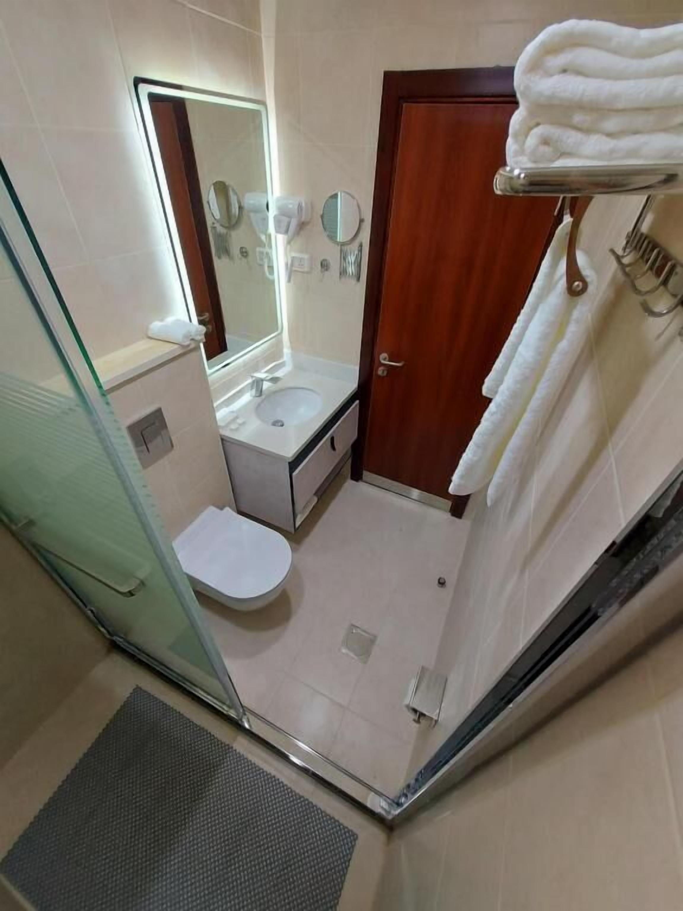 shower, free toiletries, hair dryer, slippers