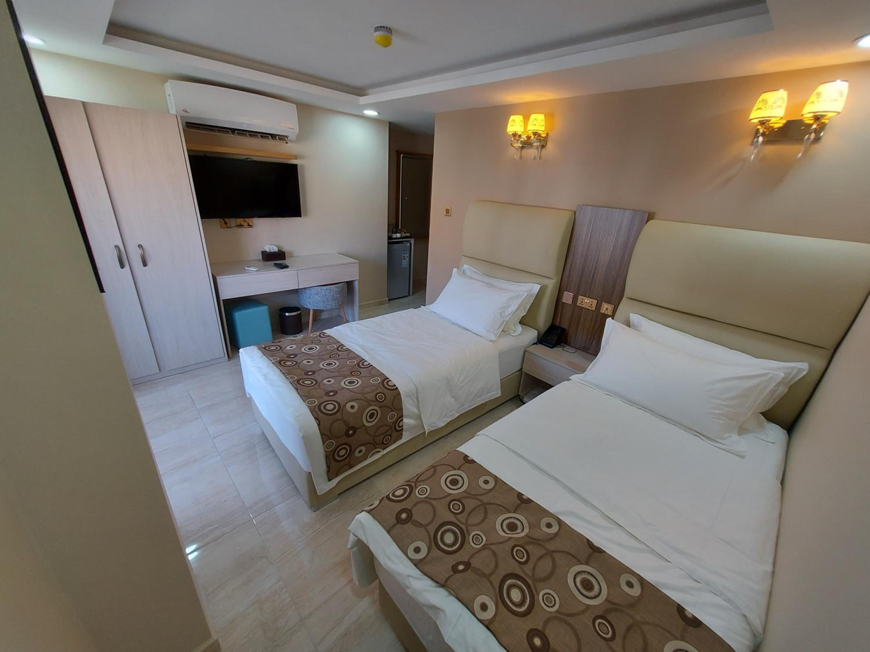 twin room, mountain view | minibar, in-room safe, desk, laptop workspace