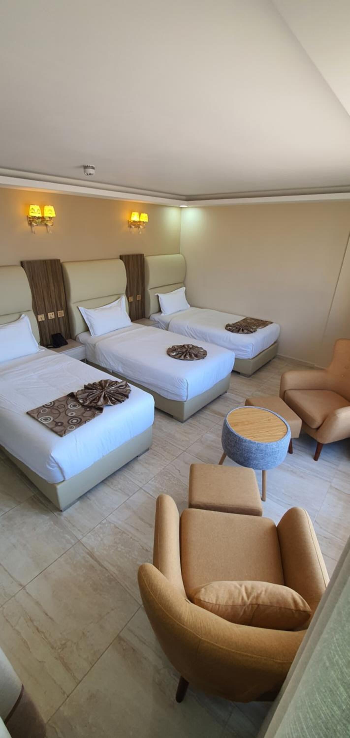 triple room, sea view | minibar, in-room safe, desk, laptop workspace