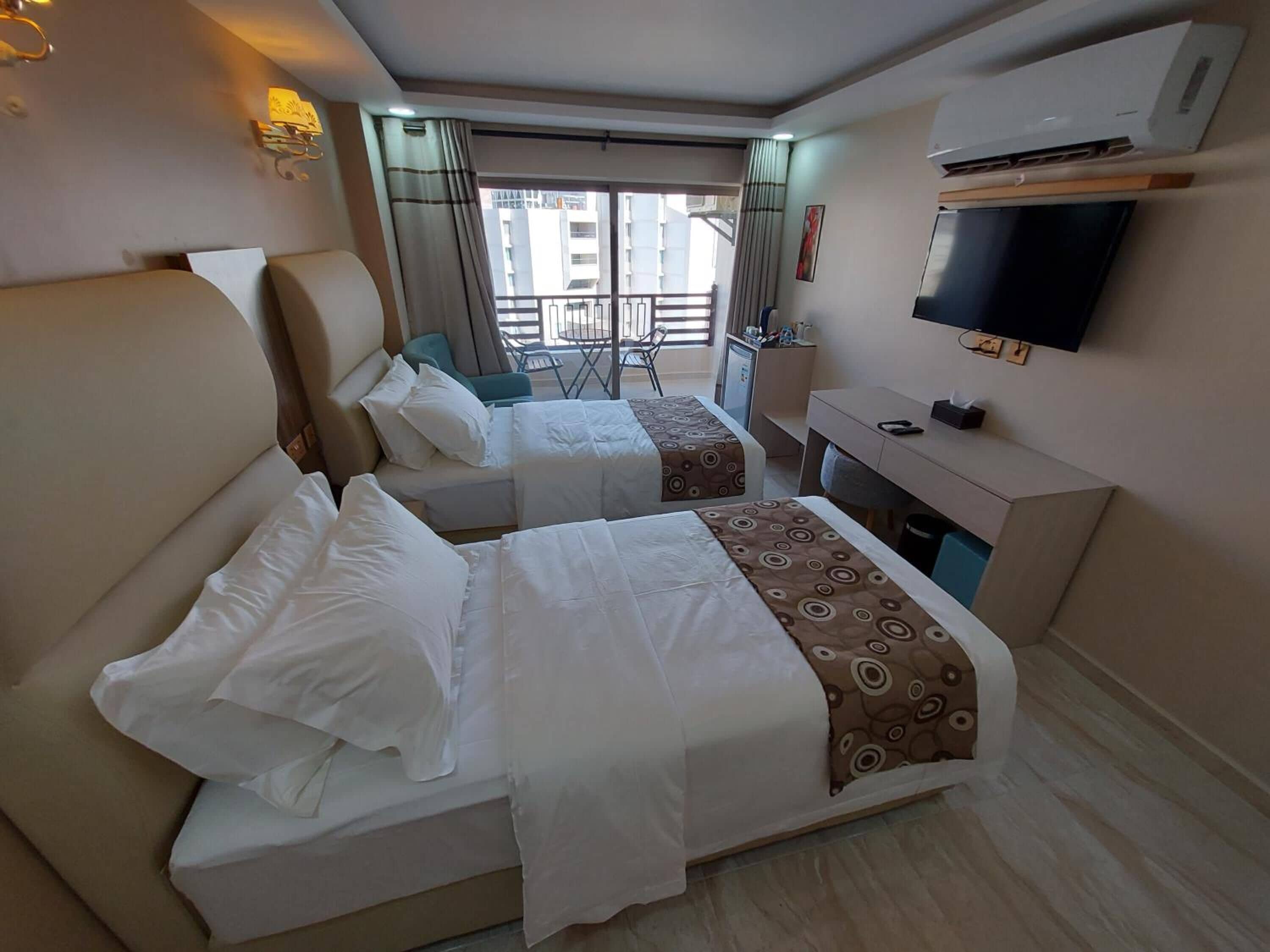 twin room, mountain view | minibar, in-room safe, desk, laptop workspace