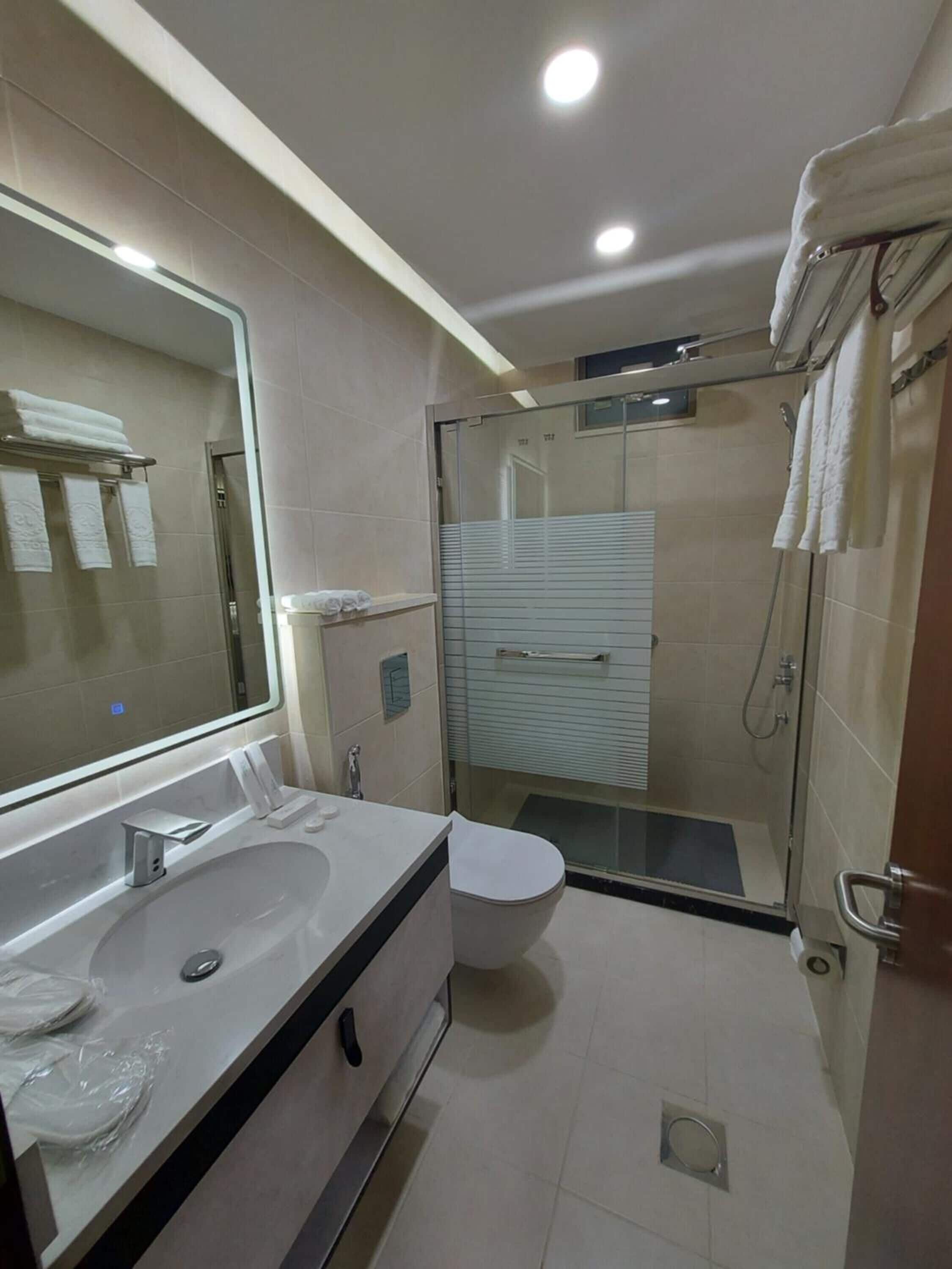 shower, free toiletries, hair dryer, slippers