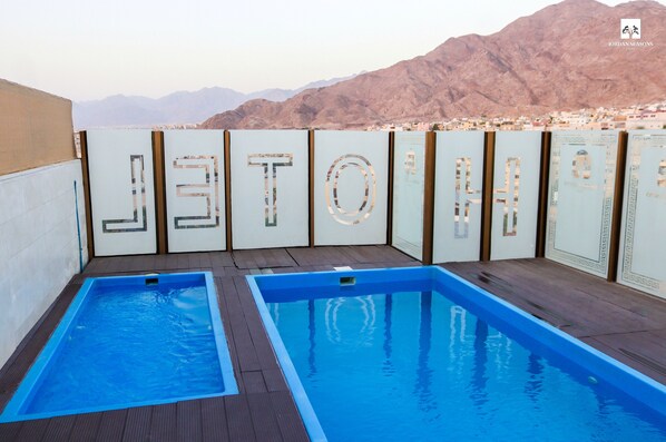 2 outdoor pools, open 7:00 AM to 6:00 PM, sun loungers