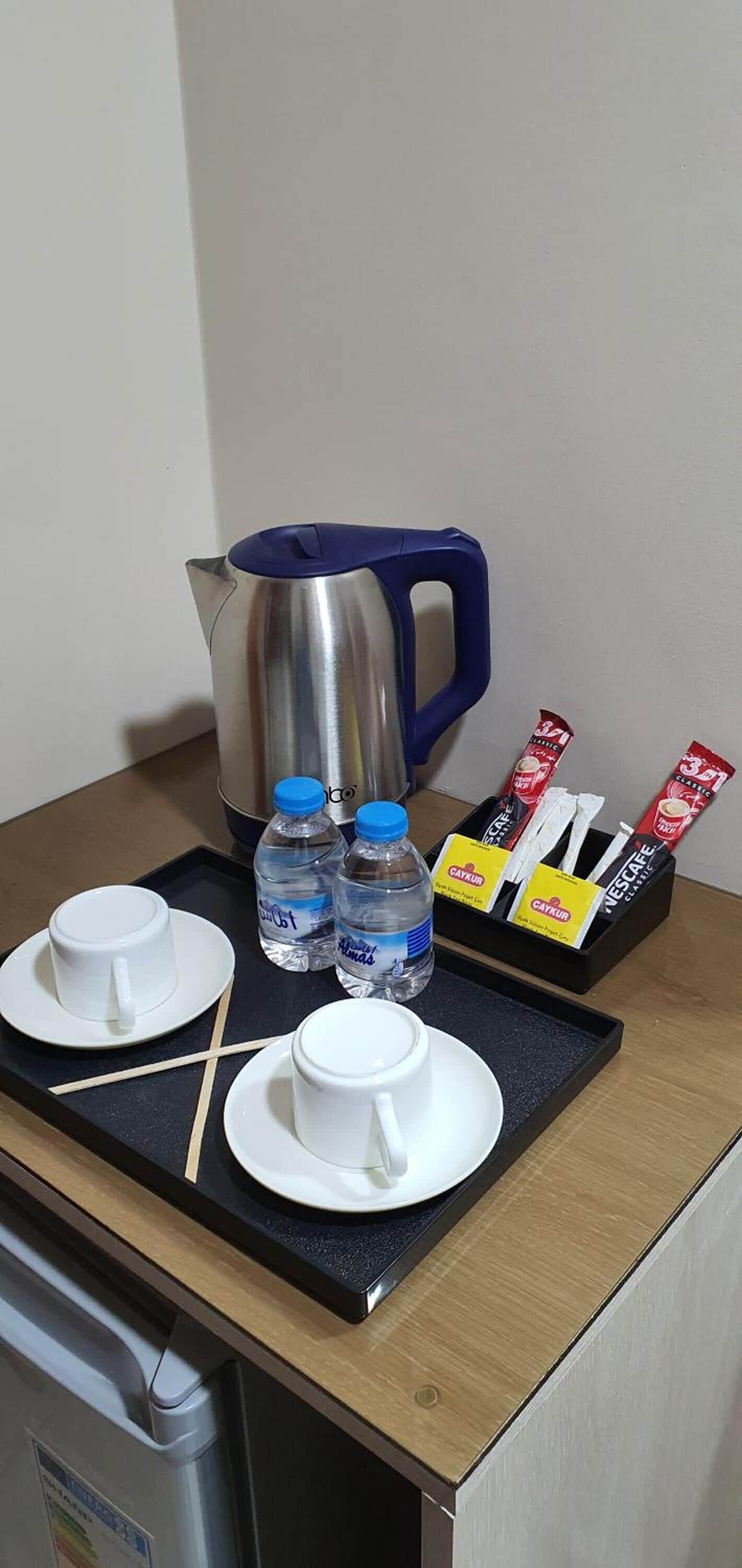 mini-fridge, microwave, coffee/tea maker, electric kettle