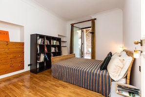 1 bedroom, desk, iron/ironing board, travel cot
