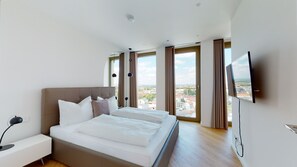 Deluxe appartement | Luxe beddengoed, donsdekens, bedden met traagschuimmatrassen