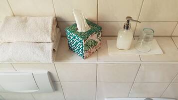 Shower, towels, soap, shampoo