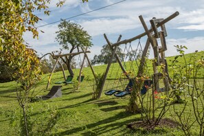 Children's area - Holiday Apartment "Risthof 2" with Shared Garden, Sauna and Playground (Owingen)