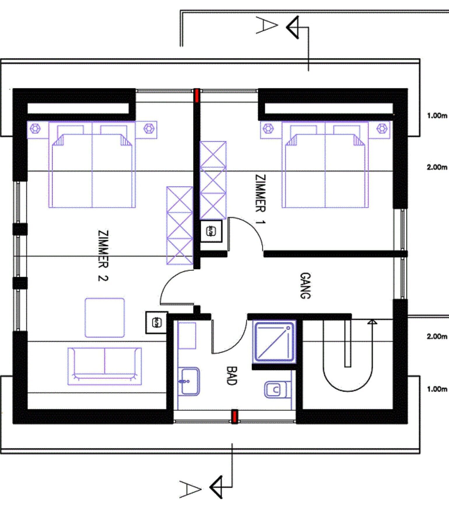 A floor plan with two bedrooms, a bathroom, a kitchen, and a living area.