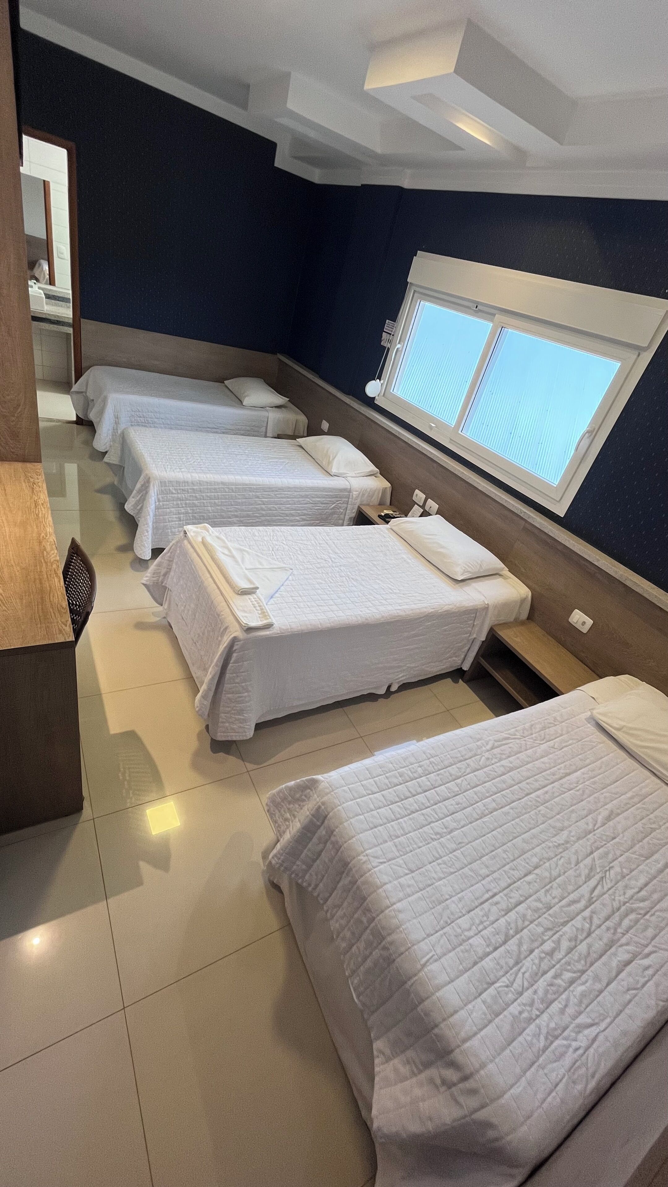 deluxe quadruple room, multiple beds | hypo-allergenic bedding, soundproofing, free wifi