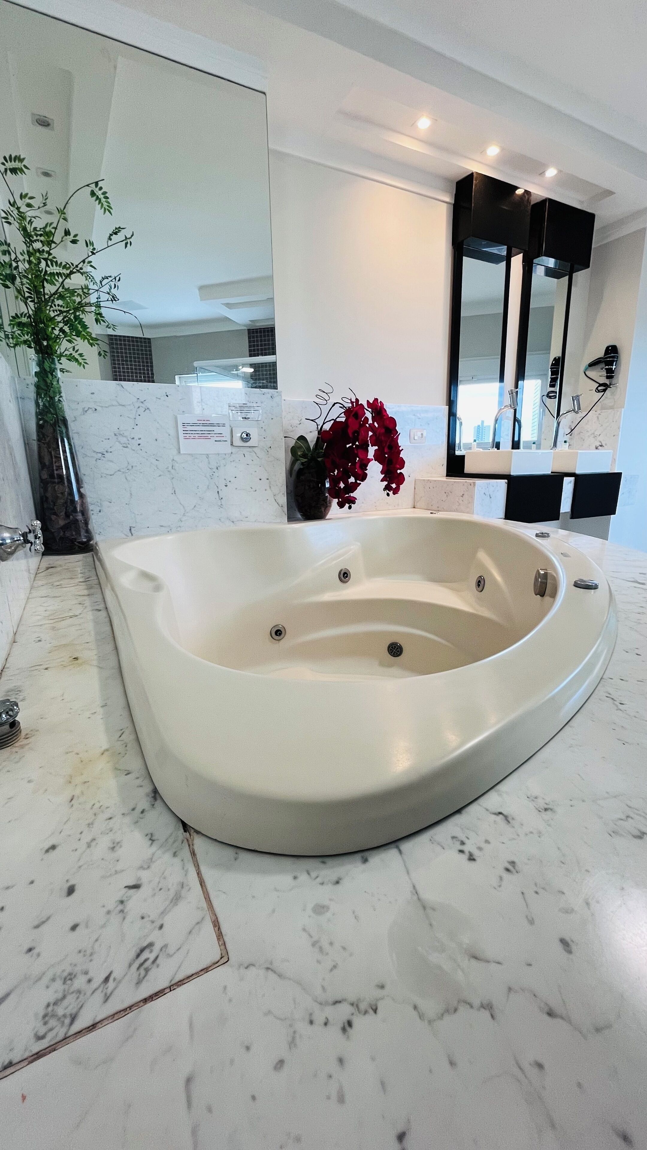 deluxe studio suite | bathroom | towels, soap, shampoo, toilet paper