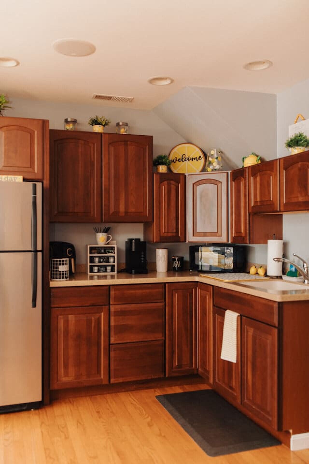 Fridge, microwave, coffee/tea maker, cookware/dishes/utensils