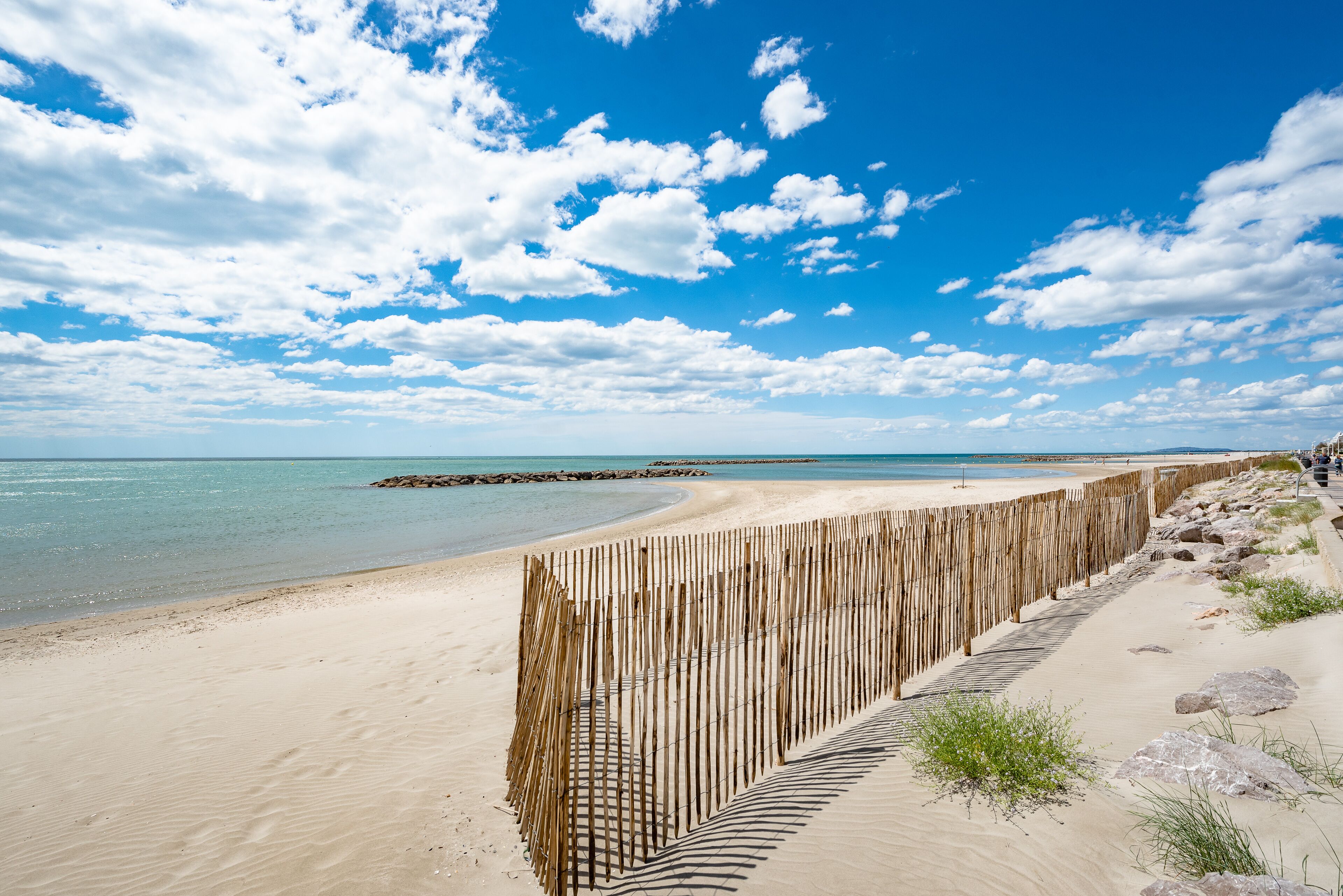 On the beach, sun loungers