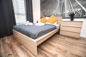 Departamento Deluxe | Ropa de cama hipoalergénica y caja de seguridad en la habitación 