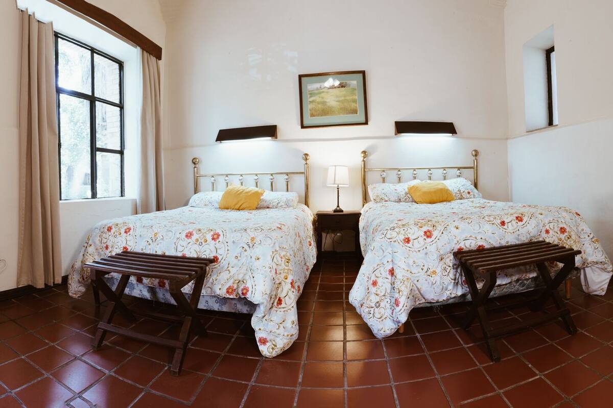 Habitación familiar, 2 habitaciones, baño privado, vista al jardín | Wifi gratis