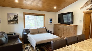 Luxury Cabin | Living room | 70-inch Smart TV with digital channels, TV, Netflix